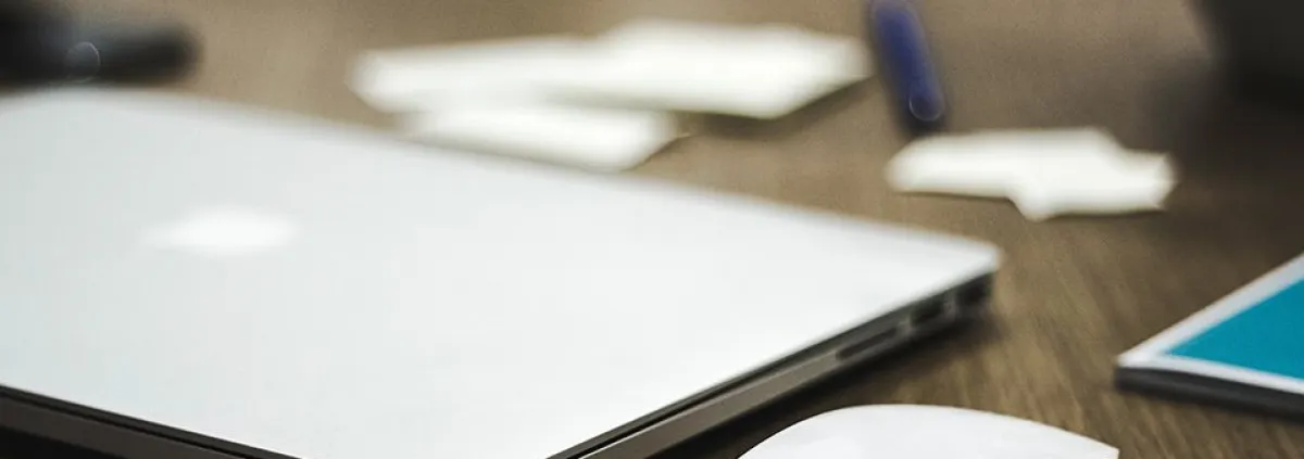 A Macbook on a desk
